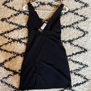 Nasty Gal “Deep on Dancing mini dress” Black.